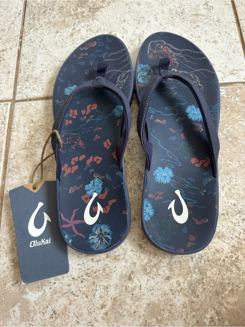 OluKai Navy Floral Print Flip Flops